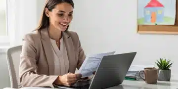 Working mother reviewing tax documents for 2026 deductions